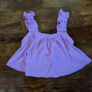 pink frilly tank top